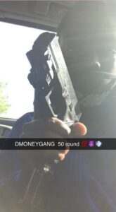 PHOTO Orlando Harris Posted Picture Of Him Holding Handgun Inside His Car With 50 Rounds Of Ammo Week Before Shooting