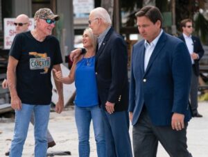 PHOTO Ron DeSantis Looking Very Unhappy Surveying The Storm Damage With Joe Biden In Florida