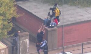 PHOTO St Louis School Students Climbed To Roof To Avoid Being Shot By Mass Shooter