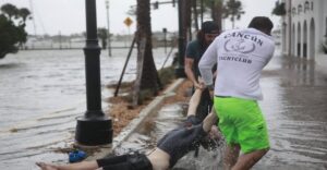 PHOTO Man Shocked By Electrical Wire In St Augustine Being Dragged Away Unconcious
