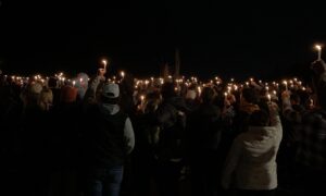 PHOTO Those Remembering Ethan Chapin Xana Kernodle Maddie Mogen Kaylee Goncalves Raise A Candle During Moment Of Silence