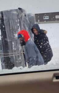 PHOTO Buffalo Residents Seriously Pulling Couch Throw 4 Feet Of Snow During Blizzard Like It's An Essential Item