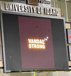 PHOTO Four White Doves On University Of Idaho Video Board At Vigil To Represent Four Students Who Died
