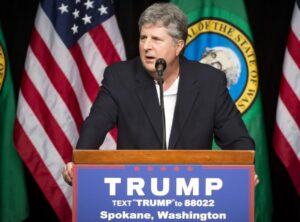 PHOTO Mike Leach Giving Speech On Podium That Says Trump For President Spokane Washington