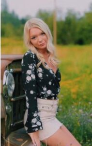 PHOTO Madison Mogen Posing For A Picture Next To An Old Truck In Idaho