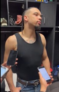 PHOTO Dillon Brooks Walking Around Grizzlies Locker Room After Loss To Lakers Just Wearing Tank Top And Jeans