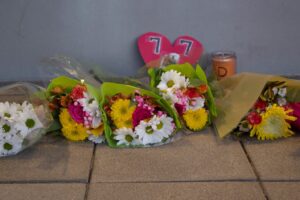 PHOTO Memorial With Flowers And Posters Setup For Devin Willock And Chandler LeCroy At Sanford Stadium