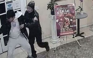 PHOTO Of Bystander Inside Dance Studio Pulling Gun Away From Huu Can Tran
