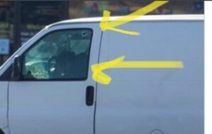 PHOTO Of Huu Can Tran Slumped Over In The Driver's Seat Of White Van After Pulling Gun On Himself