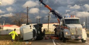 PHOTO Semi-Truck In Houston That Flipped Over Had To Be Towed After Massive Tornado