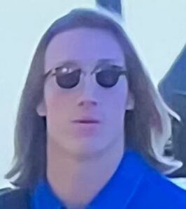 PHOTO Trevor Lawrence Walking Into Stadium With Sunglasses And Blue Polo Shirt
