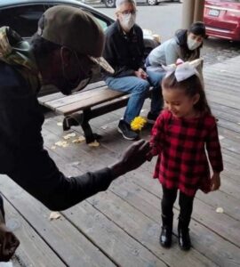 PHOTO Tyre Nichols Giving Girl A Flower At Sacramento Skatepark