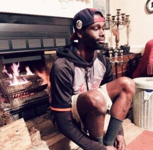 PHOTO Tyre Nichols Sitting By A Fire Place In His House