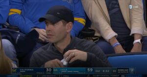 PHOTO Brad Stevens Drinking Flavored Water At CAL UCLA Men's Basketball Game In Los Angeles On Saturday Night