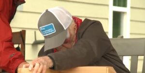 PHOTO Jimmy Carter Wearing A Jimmy Care Work Project Hat While Helping The Community