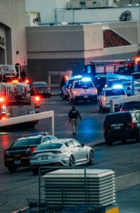 PHOTO Police With Long Guns Looking For Shooting Suspect In El Pass Mall Parking Lot