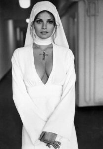 PHOTO Raquel Welch Wearing All White In 1972 With A Cross On Her Neck