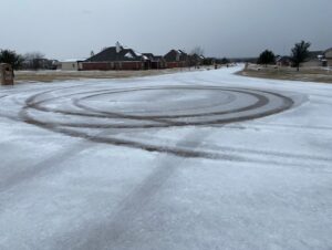 PHOTO Texas Residents Riding Their 4 Wheeler's In The Ice Storm And Making Huge Tracks On The Street