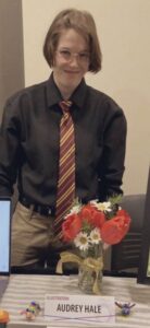 PHOTO Audrey Hale Holding Red Roses While Giving A Presentation