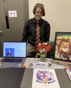 PHOTO Audrey Hale Showcasing Her Artwork While Wearing A Dress Suit And Tie Looking Like A Man