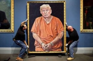 PHOTO Donald Trump In Handcuffs In A Portrait Being Put On The Wall