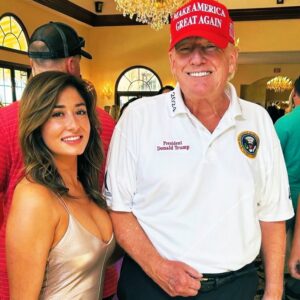 PHOTO Donald Trump Putting His Elbow On A Woman's Chest