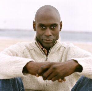 PHOTO Lance Reddick Sitting On The Beach Before He Died