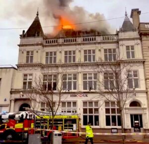 PHOTO Of Firefighters Pretending To Put Out Fire On Roof Of HSBC Bank Instead They Just Walked Around