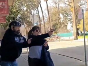 PHOTO Of Josh Fulfer's Sister Aurelia Moore Pulling Out A Gun Against LGBTQ Defenders At Sacramento Rally