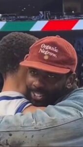 PHOTO Of Kyrie Irving Wearing Red Colored Version Of Organic Negrow Hat