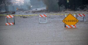 PHOTO Of The Road Just Blocked With Water On PCH In Huntington Beach So The Road Was Closed