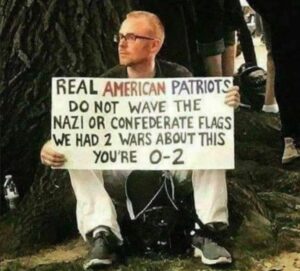 PHOTO Real American Patriots Do Not Wave The Nazi Or Confederate Flags We Had 2 Wars About This You're 0-2 Meme