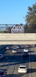 PHOTO Sign Over Freeway Overpass In Sacramento Antifa 3 Proud Boys 0