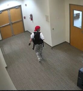 PHOTO Surveillance Footage Caught Audrey Hall Walking Down School Halls Calmly With Gun On Her Side