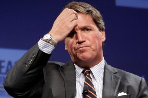 PHOTO Tucker Carlson's Face The Moment He Realized He Was Hacked By Anonymous