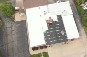 PHOTO Aerial View Of Tornado Damaging Roof Of Building In Fenton Illinois
