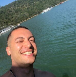 PHOTO Of Nima Momeni Shirtless Swimming In The Bay Surrounded By Yacht's