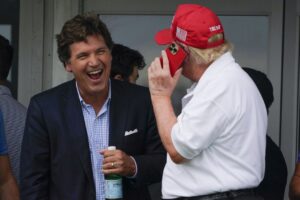 PHOTO Tucker Carlson Laughing With Donald Trump While Donald Was On The Phone