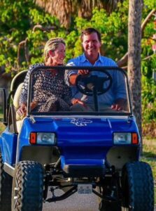 PHOTO Tucker Carlson Smiling With His Wife On Golf Cart Ride Out Of Fox News For The Final Time