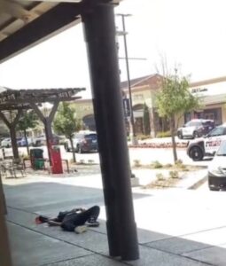 PHOTO Black Shooter In Allen TX Laying Dead Outside Outlet Store