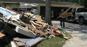 PHOTO Conroe Texas Resident's House Still Standing But Pile Of Rubble Sits In His Front Yard