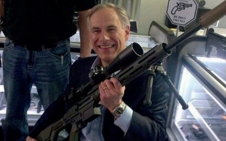 Photo Greg Abbott Holding A Very Dangerous Gun And Smiling