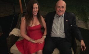 PHOTO Noelle Dunphy In A Dress Posing For A Picture With Rudy Giuliani