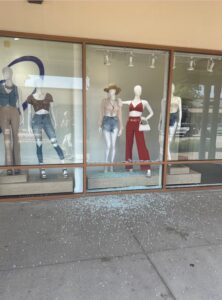 PHOTO Of Shattered Glass On One Allen Outlet Store After Shooter Blew The Glass Out