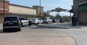 PHOTO Of Where Shooting Suspect Was Found Near Entrance Of Allen Premium Outlets