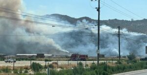 PHOTO Ramona Fire Climbing Hills And Getting Close To Houses In San Jacinto