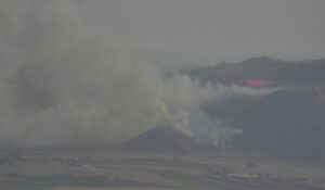 PHOTO View Of Ramona Fire From Tuesday Afternoon Shows Fire Retardant Is Helping Contain Flames On The Ground