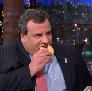 PHOTO Chris Christie Biting Into A Donut While On A Talk Show