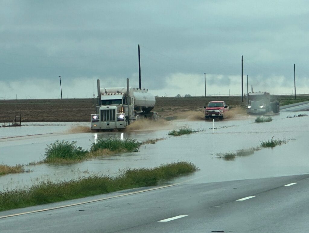 PHOTO Close Up Of Flooding And Disabled Cars Between Tahoka And O