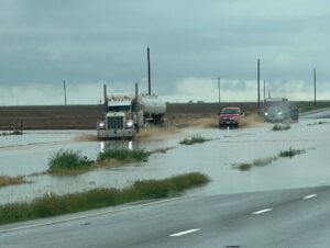 PHOTO Close Up Of Flooding And Disabled Cars Between Tahoka And O’Donnell Texas On US Highway 87